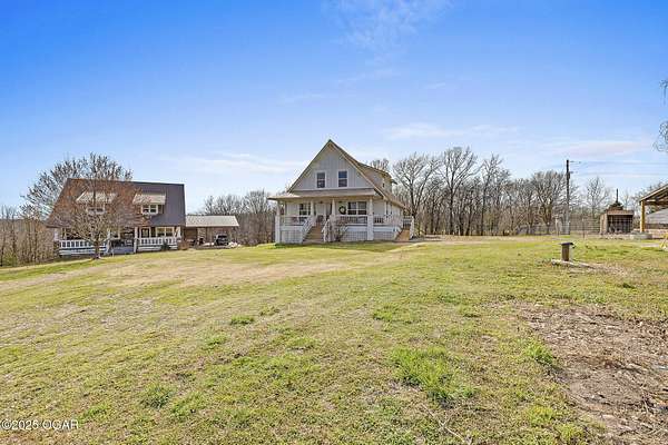 5 Acres of Residential Land with Home for Sale in Noel, Missouri