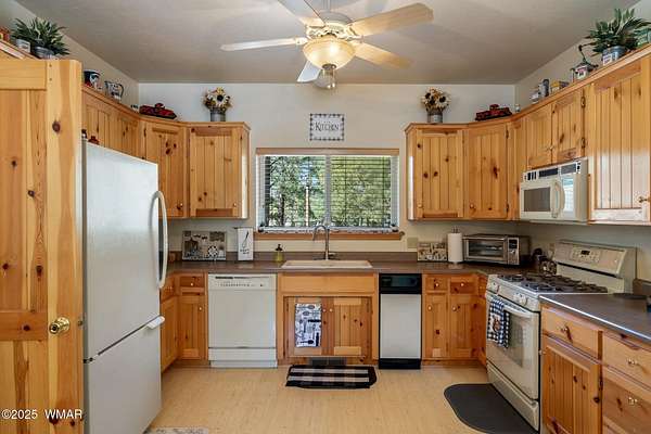 5.2 Acres of Residential Land with Home for Sale in Nutrioso, Arizona