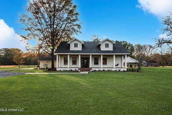 7.2 Acres of Residential Land with Home for Sale in Benton, Mississippi