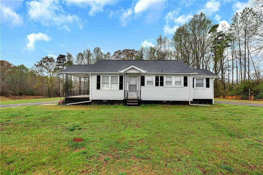 2.3 Acres of Residential Land with Home for Sale in Easley, South Carolina