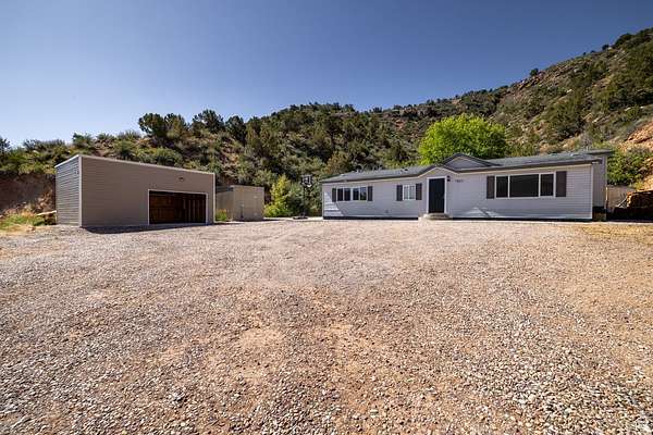 5.9 Acres of Residential Land with Home for Sale in Vernal, Utah