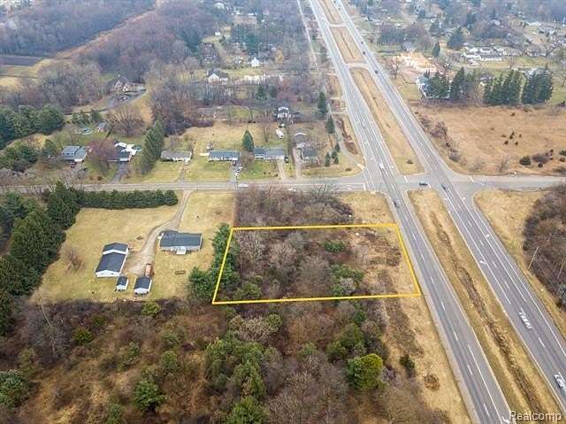 0.6 Acres of Commercial Land for Sale in Hartland, Michigan