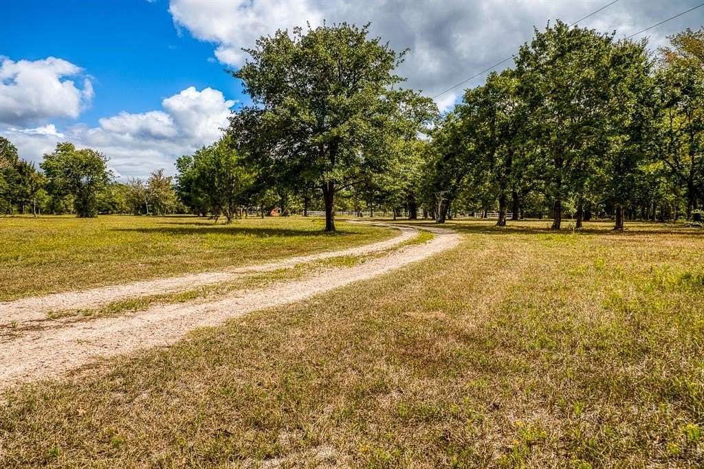 33.6 Acres of Agricultural Land with Home for Sale in Bedias, Texas