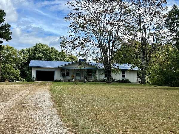 3.85 Acres of Land with Home for Sale in Deer, Arkansas