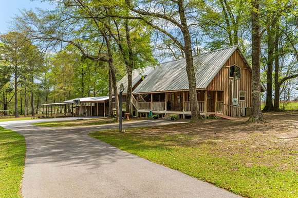 3.29 Acres of Residential Land with Home for Sale in Baker, Florida