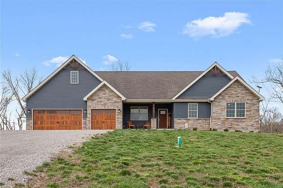 10 Acres of Residential Land with Home for Sale in Defiance, Missouri
