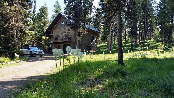 34.6 Acres of Recreational Land with Home for Sale in Seeley Lake, Montana