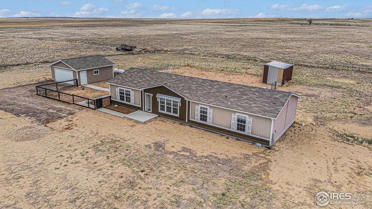 3 Acres of Residential Land with Home for Sale in Briggsdale, Colorado