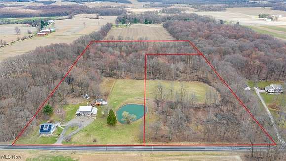 12.4 Acres of Land with Home for Auction in North Lawrence, Ohio