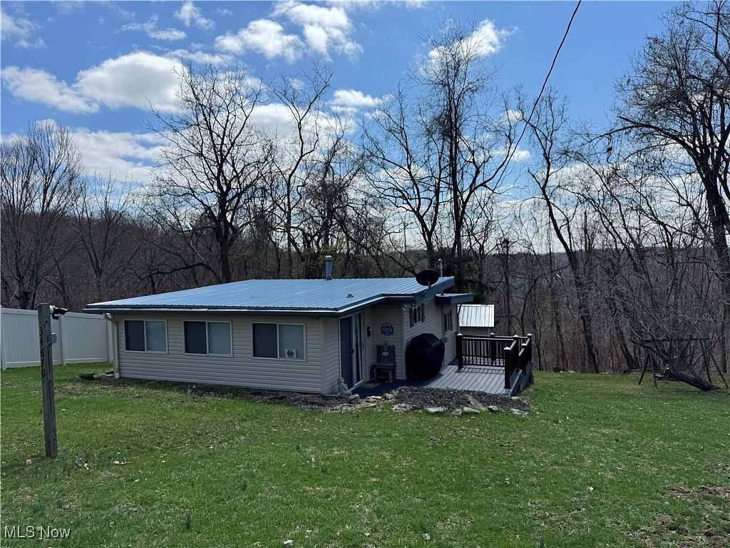 0.41 Acres of Residential Land with Home for Sale in Piedmont, Ohio