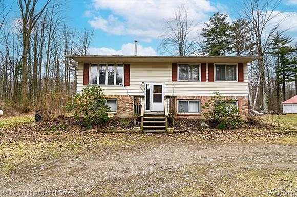 9 Acres of Residential Land with Home for Sale in Clyde Township, Michigan