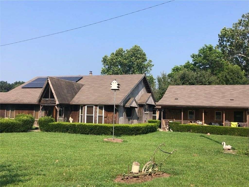 15 Acres of Land with Home for Sale in Harrisonville, Missouri