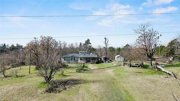 4.66 Acres of Residential Land with Home for Sale in Mount Pleasant, Texas