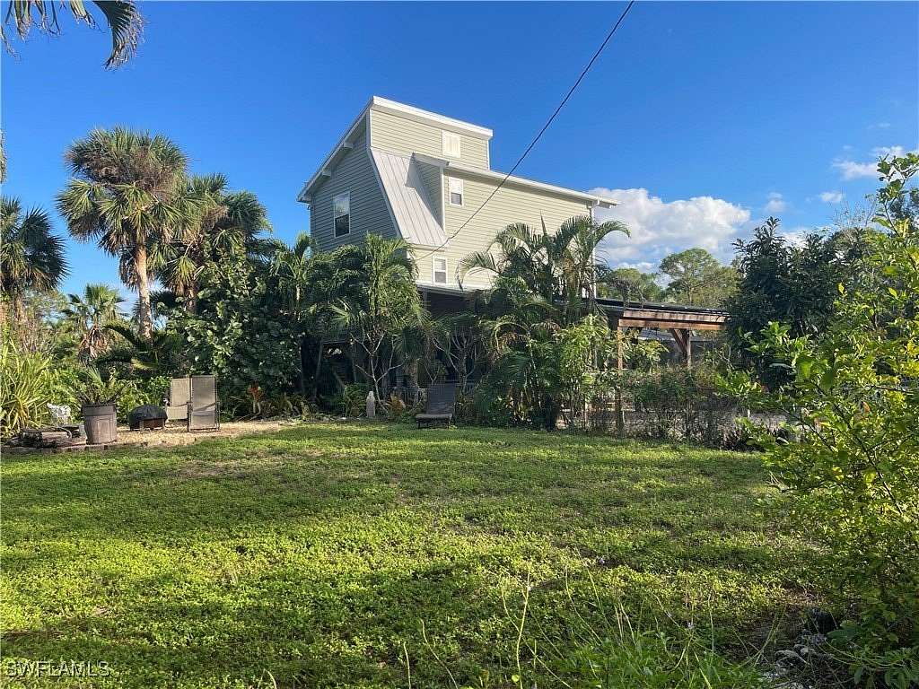 10.1 Acres of Land with Home for Sale in Bokeelia, Florida