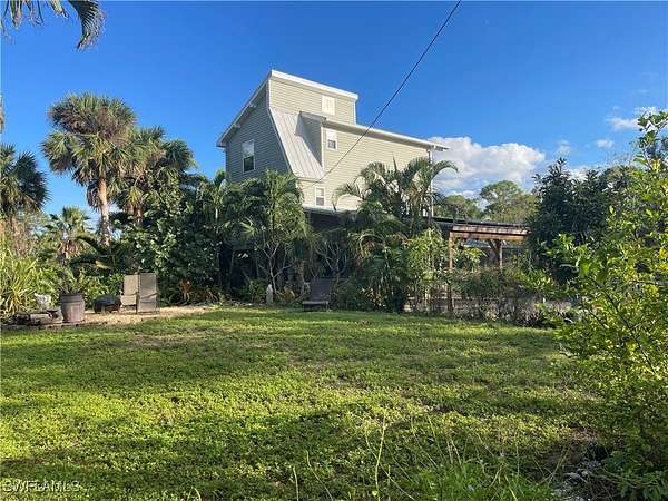 10.1 Acres of Land with Home for Sale in Bokeelia, Florida