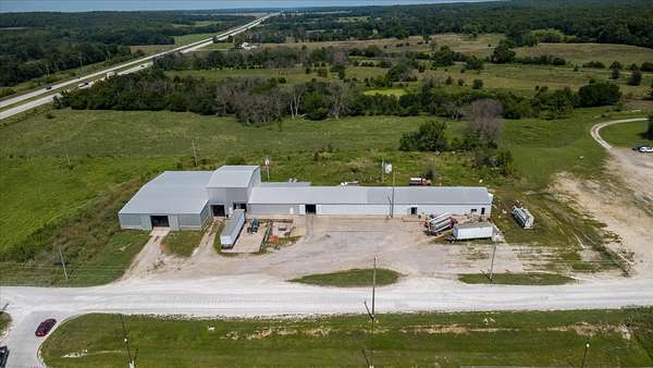 5 Acres of Improved Commercial Land for Sale in Humansville, Missouri