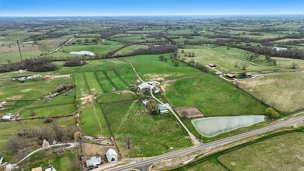 51 Acres of Land with Home for Sale in Paris, Kentucky