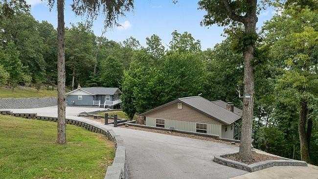 3.3 Acres of Residential Land with Home for Sale in Rogers, Arkansas