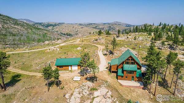 20 Acres of Land with Home for Sale in Bellvue, Colorado