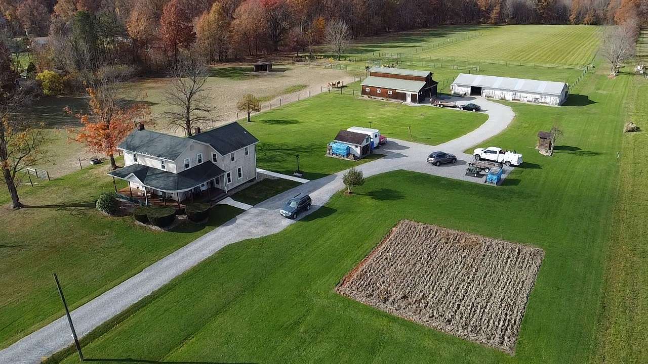 26 Acres of Agricultural Land with Home for Sale in Deerfield, Ohio