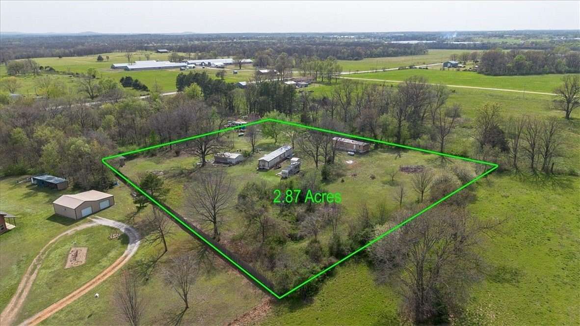 2.82 Acres of Land with Home for Sale in Siloam Springs, Arkansas