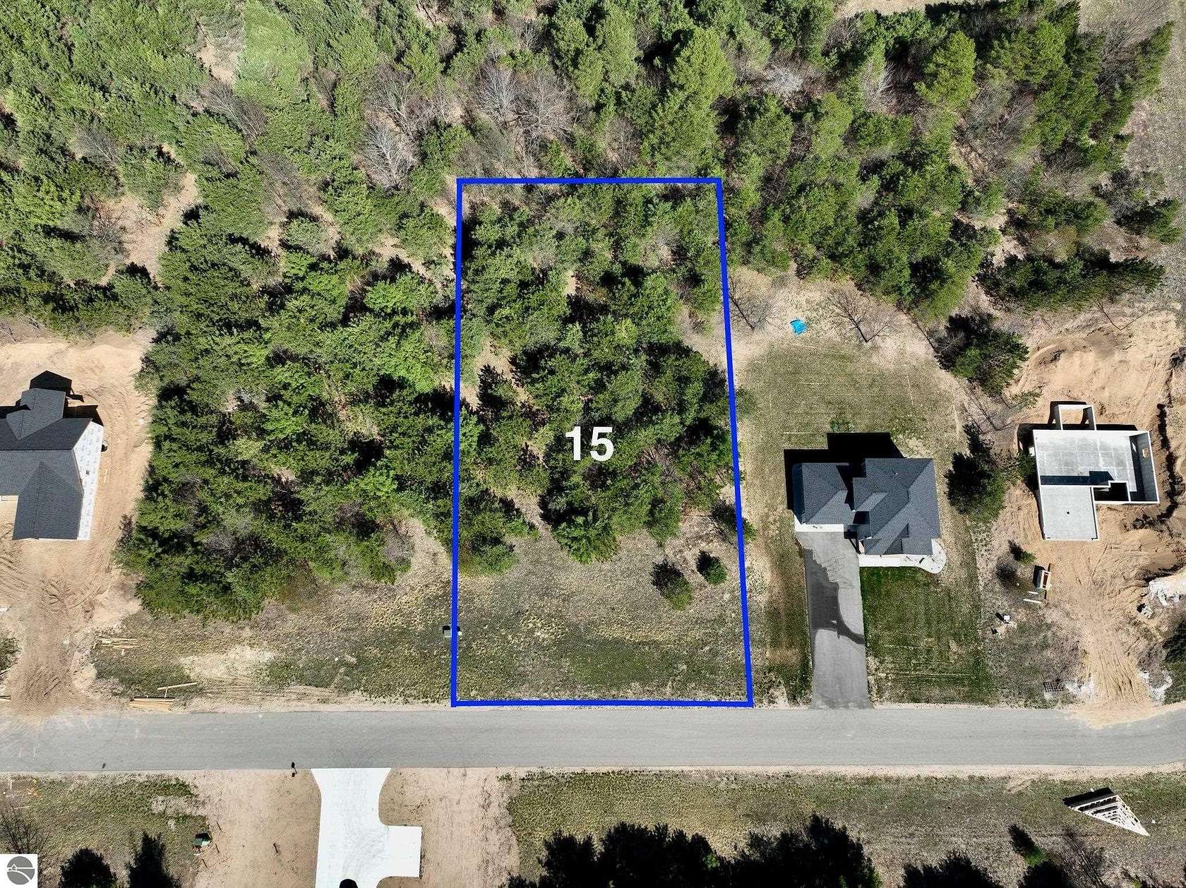 0.69 Acres of Residential Land for Sale in Grawn, Michigan