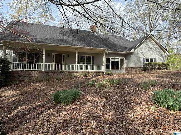 13.2 Acres of Land with Home for Sale in Columbiana, Alabama