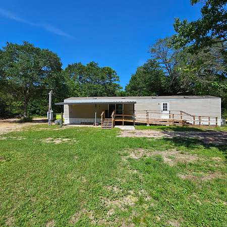 5.5 Acres of Residential Land with Home for Auction in Crestview, Florida