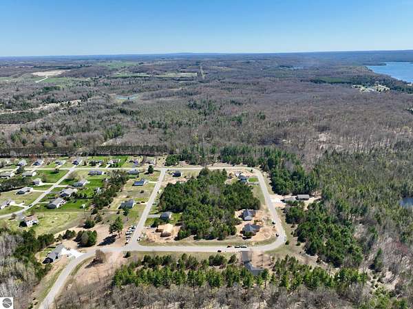 0.69 Acres of Residential Land for Sale in Grawn, Michigan