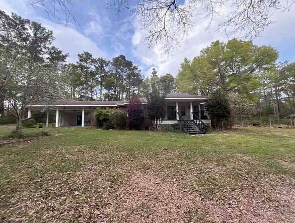 20 Acres of Land with Home for Auction in Chunchula, Alabama