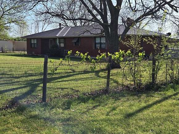 6.24 Acres of Land with Home for Sale in Nocona, Texas