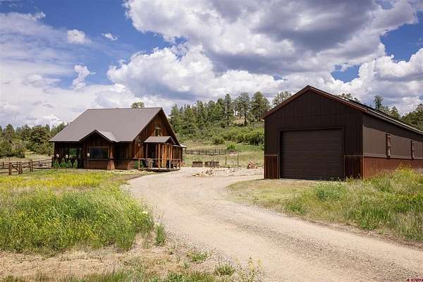 5.12 Acres of Residential Land with Home for Sale in Pagosa Springs, Colorado