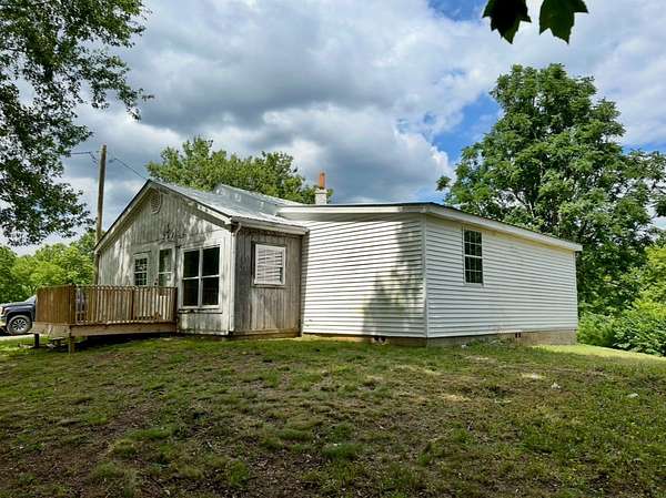 45 Acres of Land with Home for Sale in Liberty, Kentucky