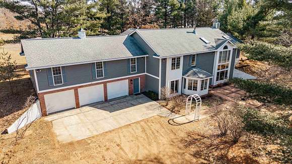 24 Acres of Recreational Land with Home for Sale in Arkdale, Wisconsin