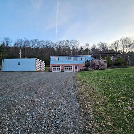 10 Acres of Land with Home for Sale in Mainesburg, Pennsylvania