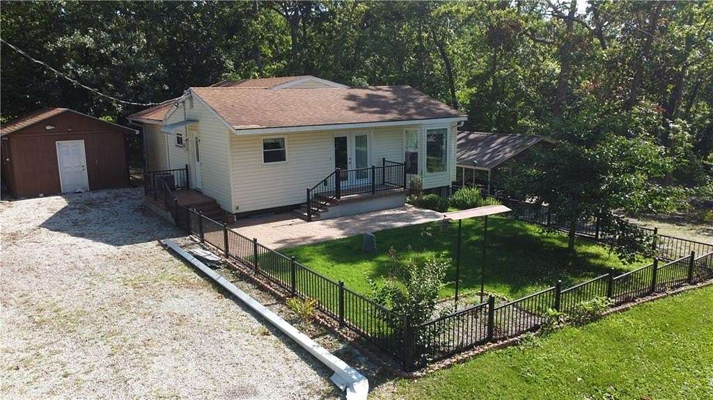 5.5 Acres of Residential Land with Home for Sale in Warsaw, Missouri