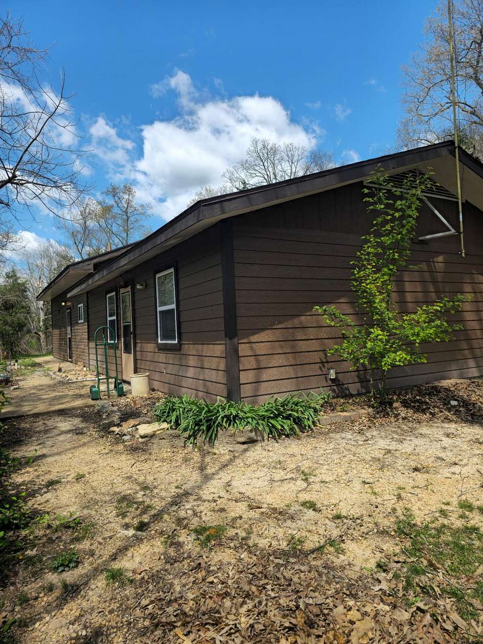 13.6 Acres of Land with Home for Sale in Theodosia, Missouri