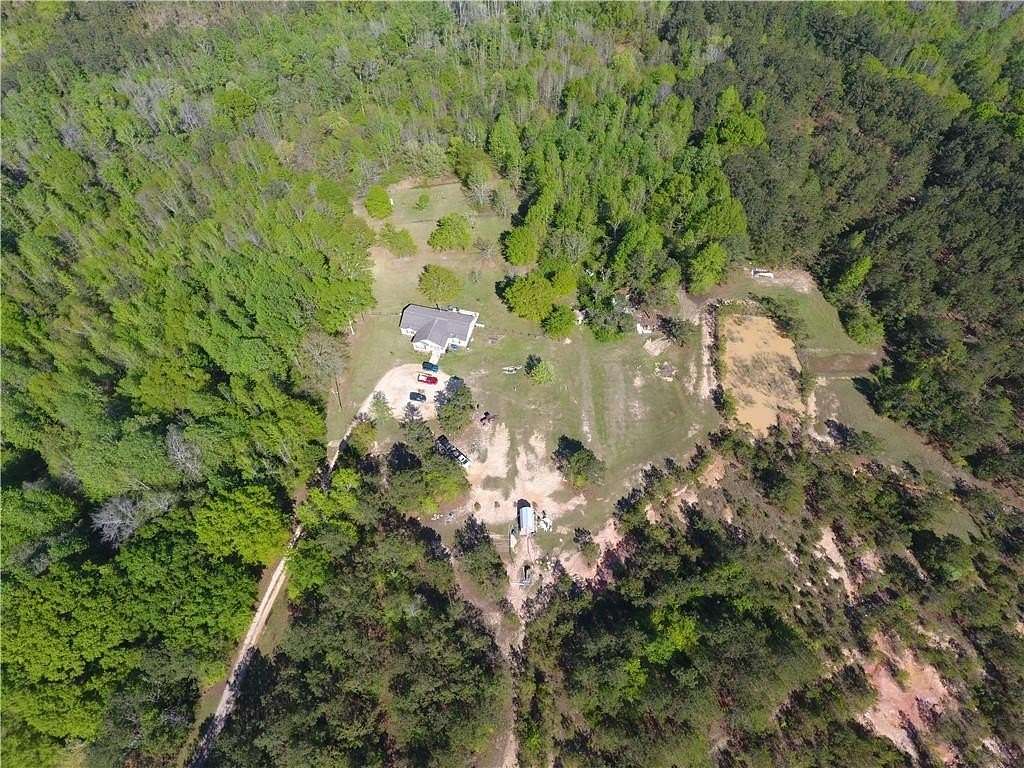 53.8 Acres of Recreational Land with Home for Sale in Opelika, Alabama