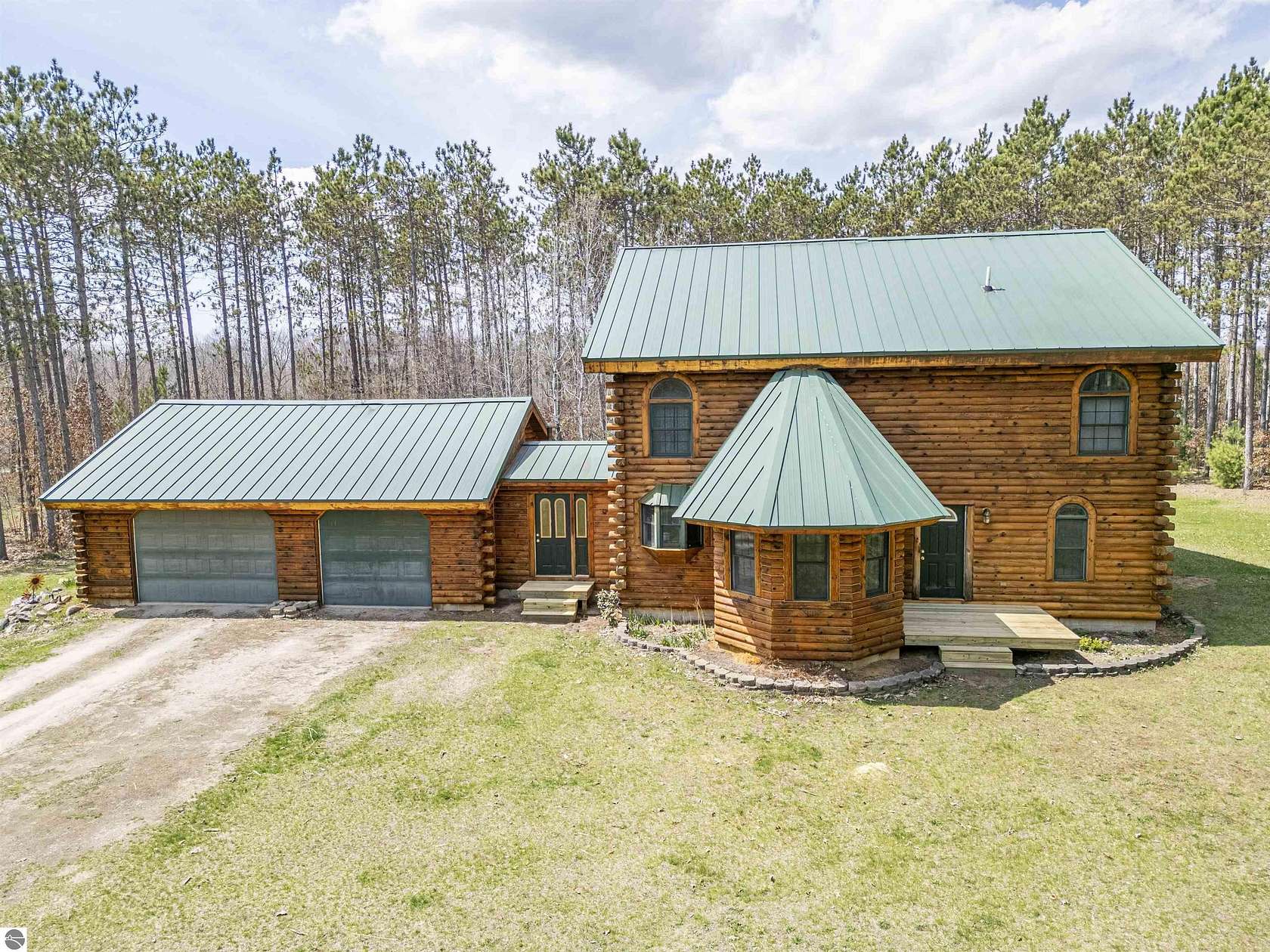 10 Acres of Recreational Land with Home for Sale in Weidman, Michigan