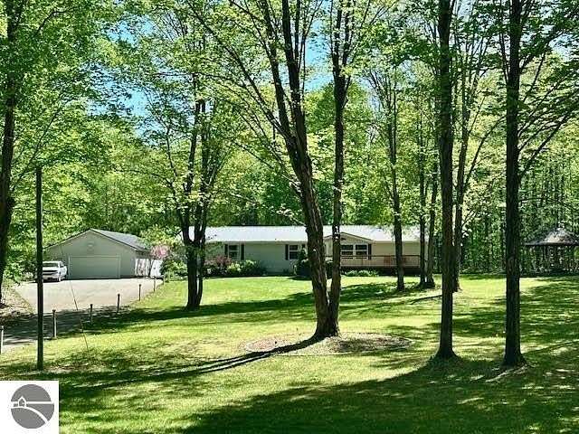 4 Acres of Residential Land with Home for Sale in Bellaire, Michigan