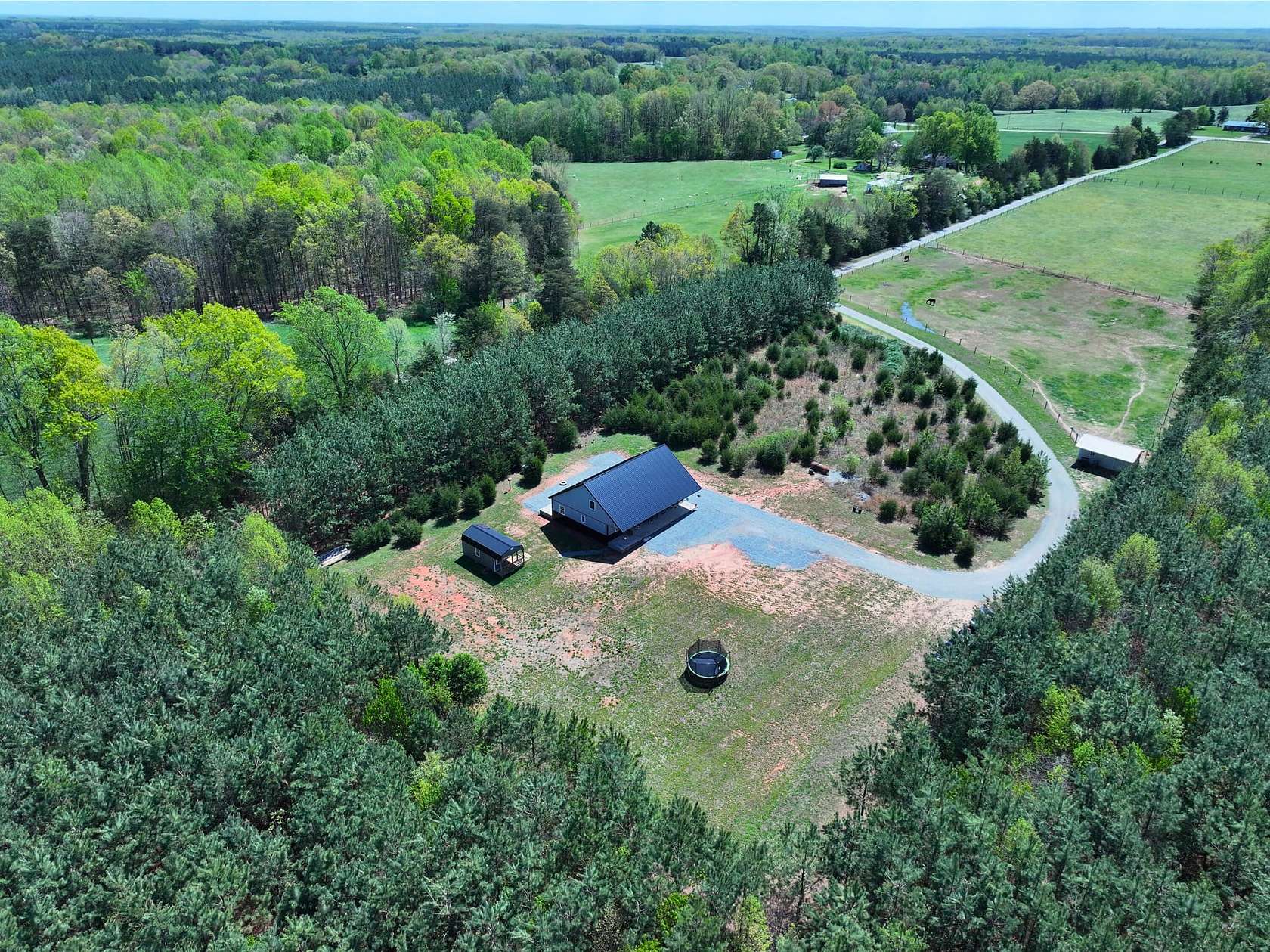 76.7 Acres of Recreational Land with Home for Sale in Nathalie, Virginia