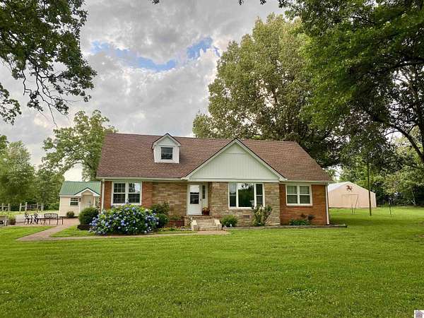 7 Acres of Land with Home for Sale in Murray, Kentucky