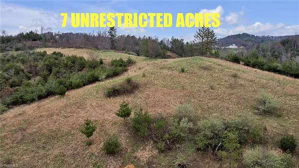 7 Acres of Residential Land for Sale in Grassy Creek, North Carolina