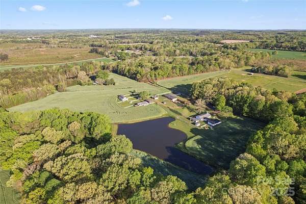 30 Acres of Agricultural Land with Home for Sale in New London, North Carolina