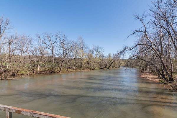 203 Acres of Land with Home for Sale in Cape Fair, Missouri