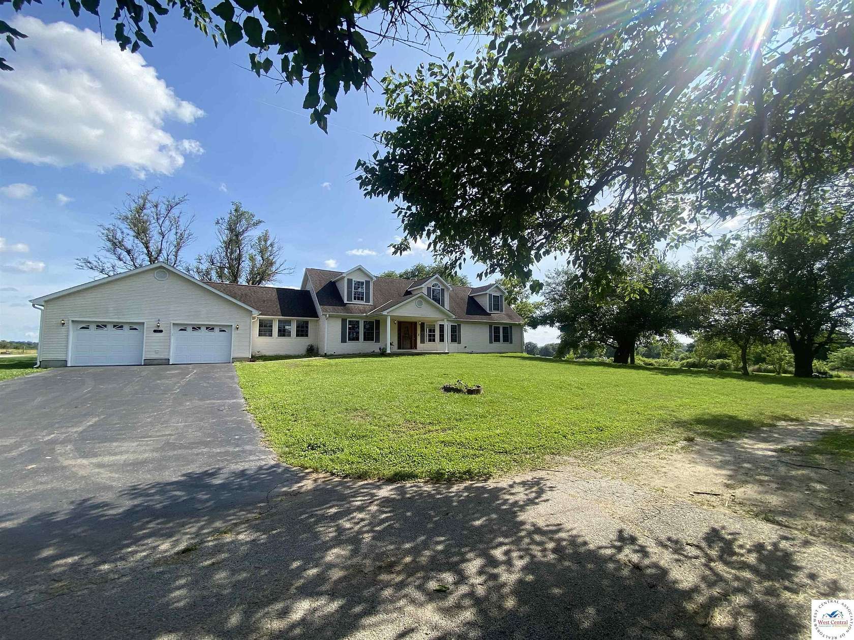 5.57 Acres of Land with Home for Sale in Lowry City, Missouri