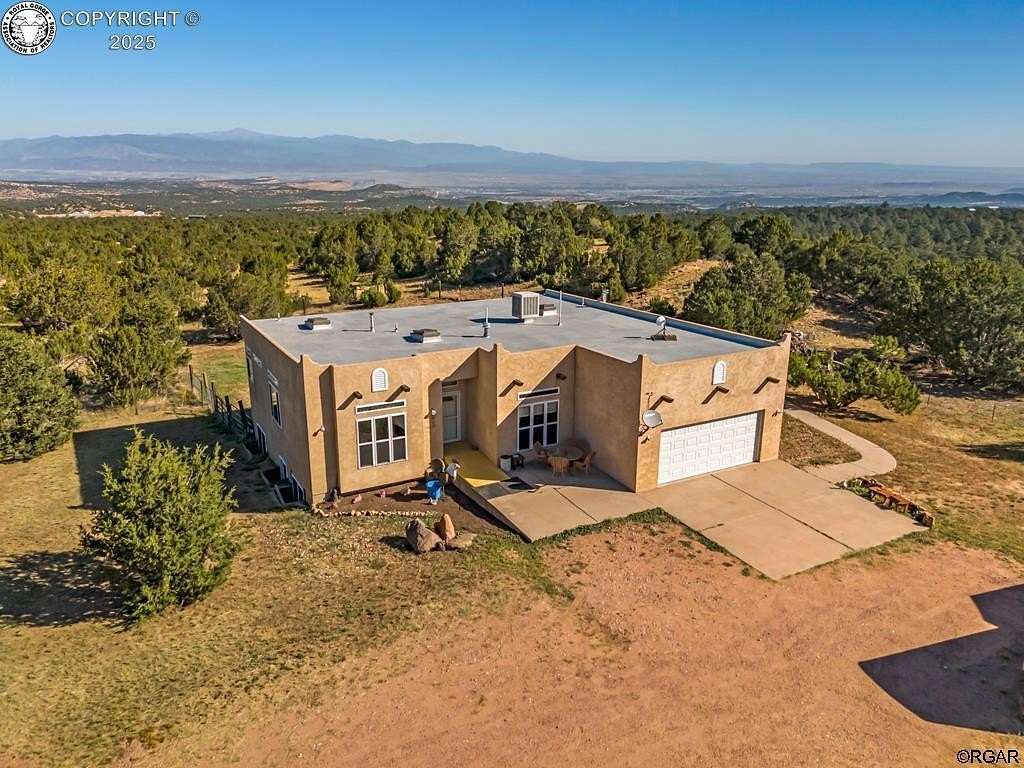 35.8 Acres of Recreational Land with Home for Sale in Florence, Colorado