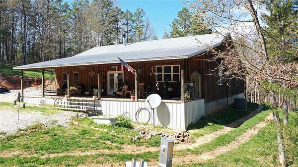 3 Acres of Residential Land with Home for Sale in Raymondville, Missouri