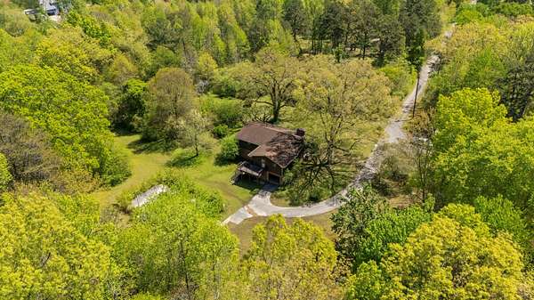 34.5 Acres of Agricultural Land with Home for Sale in Hixson, Tennessee