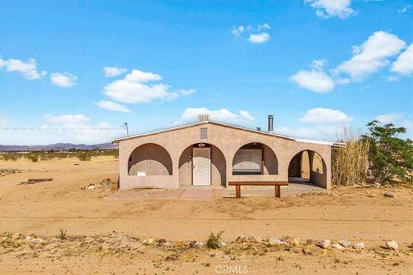 5 Acres of Residential Land with Home for Sale in Landers, California
